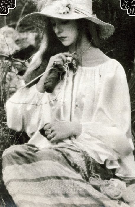 Hat by Edward Mann. Shirt by Bus Stop. Skirt by Angela at London Town.