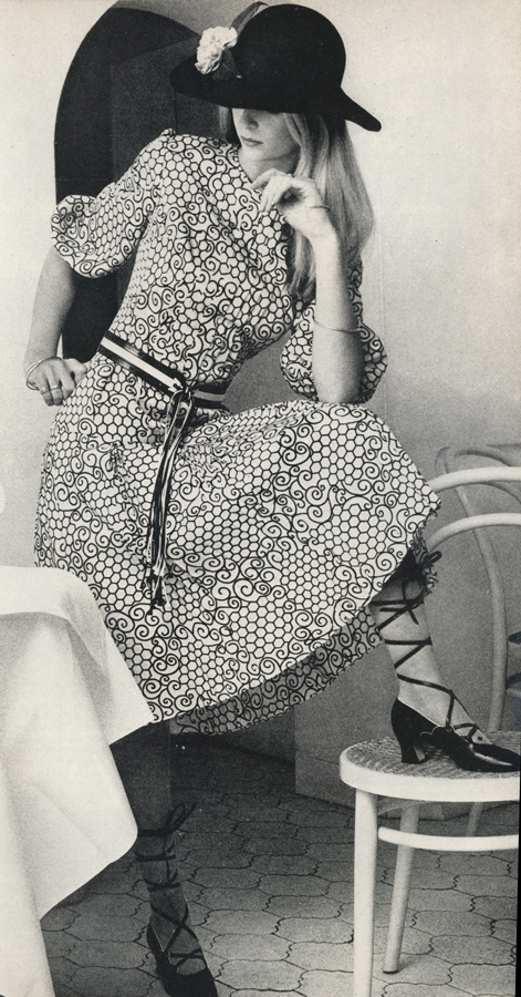 Dress by Susan Small. Hat by Jean Charles Brosseau for Sonia Rykiel. Shoes by Kurt Geiger. Photographed in Mr Chow's Montpelier Restaurant.