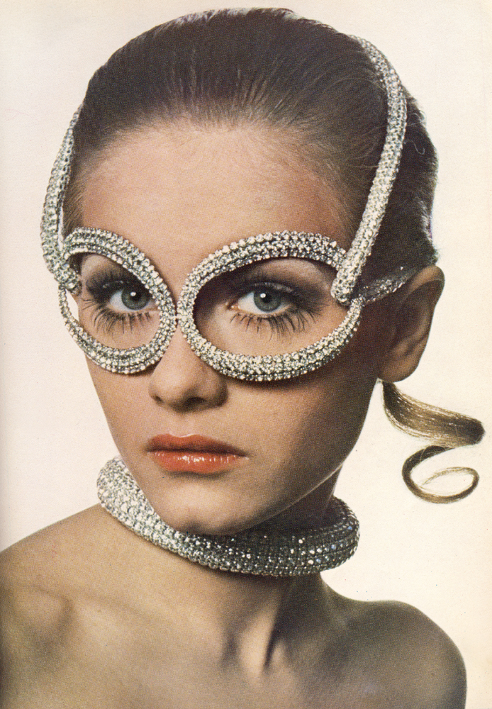 Rhinestone spectacles and collar are by Halston of New York