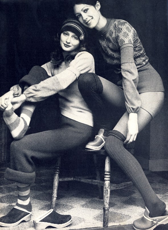 Dusty pink puff sleeved sweater over a beige linen sweater. Both by Harold Ingram. Thick purple wool trousers at Biba. Striped socks, Ruskin at Kensington Market. Knit cap by Margaret Howell at The Sweet Shop. Rose in glass pin, Marie Middleton at Chelsea Antique Market. Jacquard sweater by Toto at branches of Crowthers. Mushroom beige sweater underneath by Harold Ingram. Royal blue cashmere shorts, McGregor of Dublin. Over the knee socks by Donald Davies.