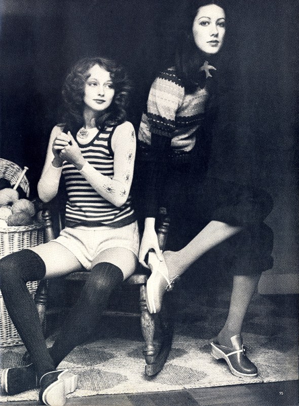 Vest and pullover both by Alice Pollock at Quorum. Pink knitted shorts by Alistair Cowin at Grade One. All clogs from Mayfair Market. Puff sleeved sweater in stripes of tuqouoise, pink and navy, acrylic tibbed dark blue polo neck undeneath, dark blue knitted trousers rolled up. All by John Craig at Stop the Shop. 