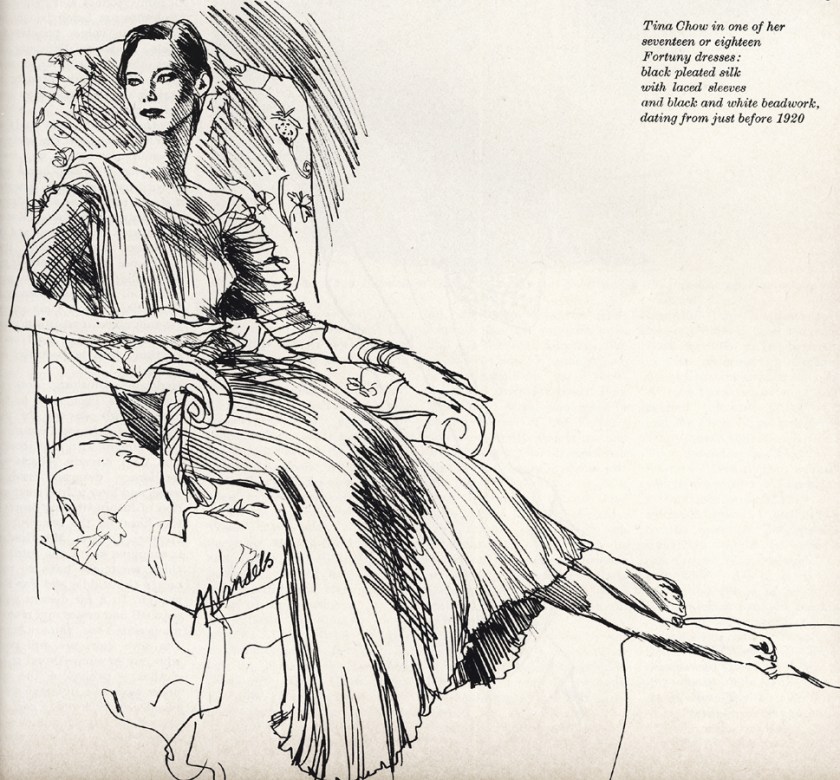 Tina Chow in one of her seventeen or eighteen Fortuny dresses: black pleated silk with laced sleeves and black and white beadwork, dating from just before 1920.