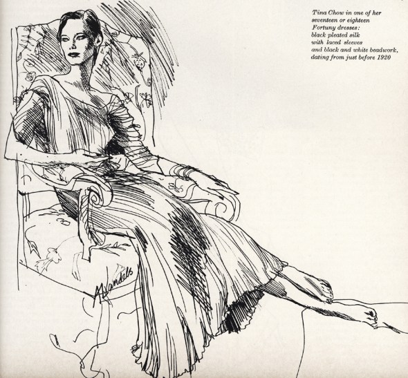 Tina Chow in one of her seventeen or eighteen Fortuny dresses: black pleated silk with laced sleeves and black and white beadwork, dating from just before 1920.