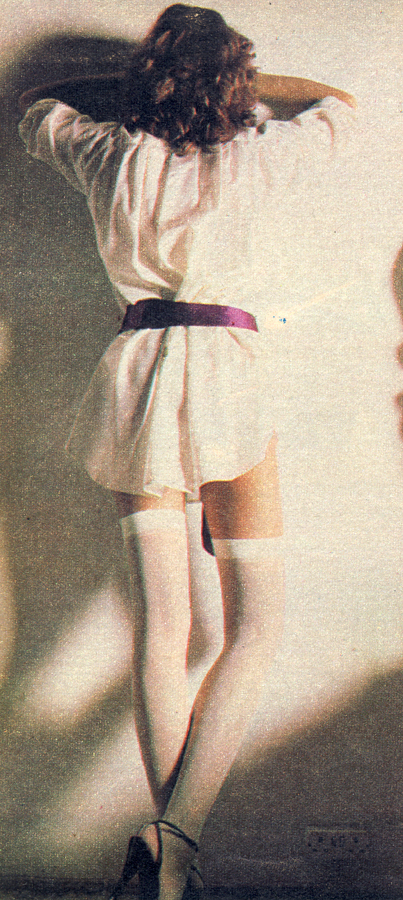 Snow white stockings by Mary Quant. Patent shoes by Sacha. Silk shirt by Betty Jackson for Quorum.