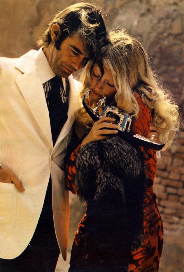 Lui: Jacket by Harry Lans from Printemps Brummell. Shirt and tie by Francesco Smalto. Trousers by Brummell. Elle: Dress by Ossie Clark. Silver fox fur by Robert Beaulieu.