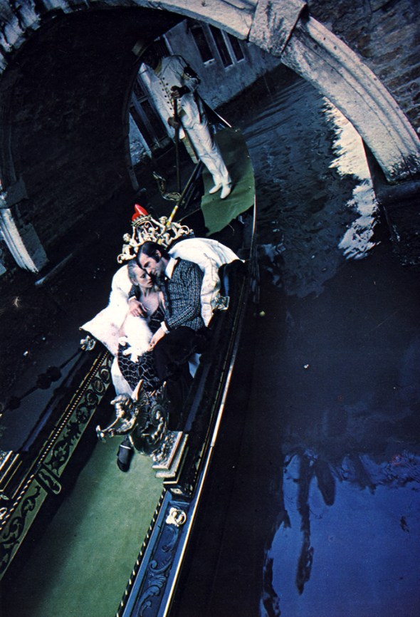 Lui: Sweater by Francesco Smalto. Shirt by Elysees Soieries. Satin neck tie by Elysees Soieries. Elle: Dress by Vesscheringe Brard. White fox fur by Robert Beaulieu.