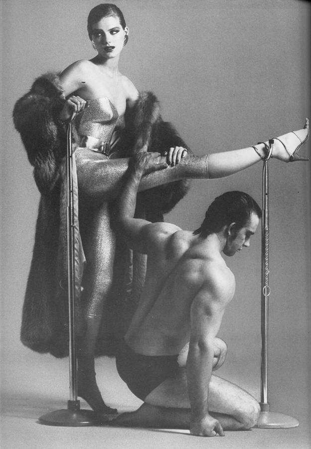 Coat by Zwirn. Gold trousers and bustier by Ritzy. Red and gold leather shoes by Caovilla from Rayne.