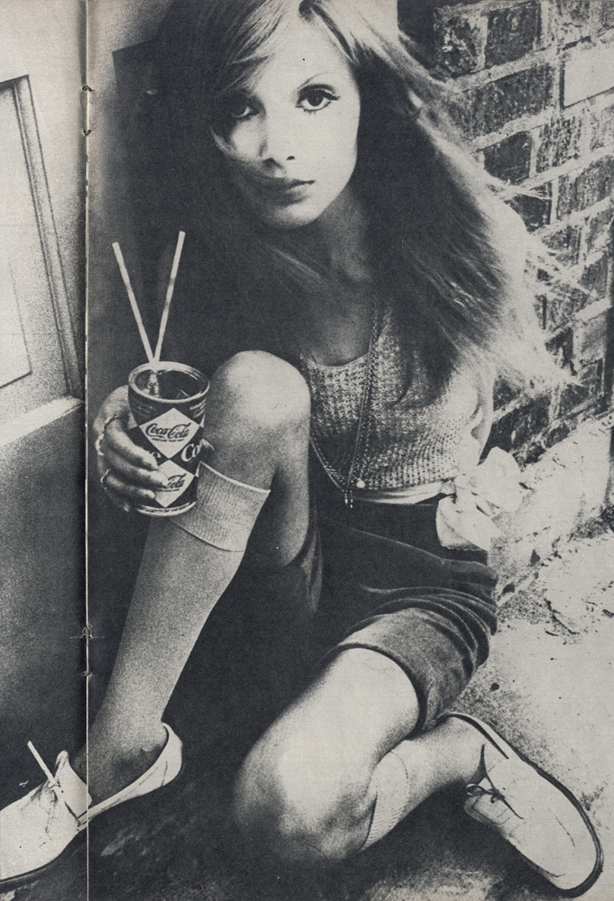 Sweater by Sharcleod. Bermudas by Miss Selfridge. White patent shoes from Russell and Bromley. Tummy chains from Corocraft.