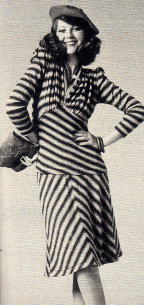 This natty knitted two-piece by Plaza will set you back an uninflated £8.90 but teamed with the right accessories - beret, clutch bag, courts - looks like it could carry a £30+ tag. The fabric is a clingy wool jersey in shades of cranverry, black and grey. You'll find the set at Che Guevara, Kensington High Street and all branches of Bobby Cousins.