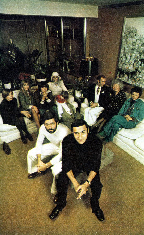 At Michaeljohn: Back row, from left: Jean Muir, Britt Ekland, Joanna Lumley, Joan Collins and her daughter Sasha, Tom Gilbey, Gina Fratini and Diane Logan. Front: John Isaacs and Michael Rasser (one time colleagues at Leonard), who started Michaeljohn in 1967. 