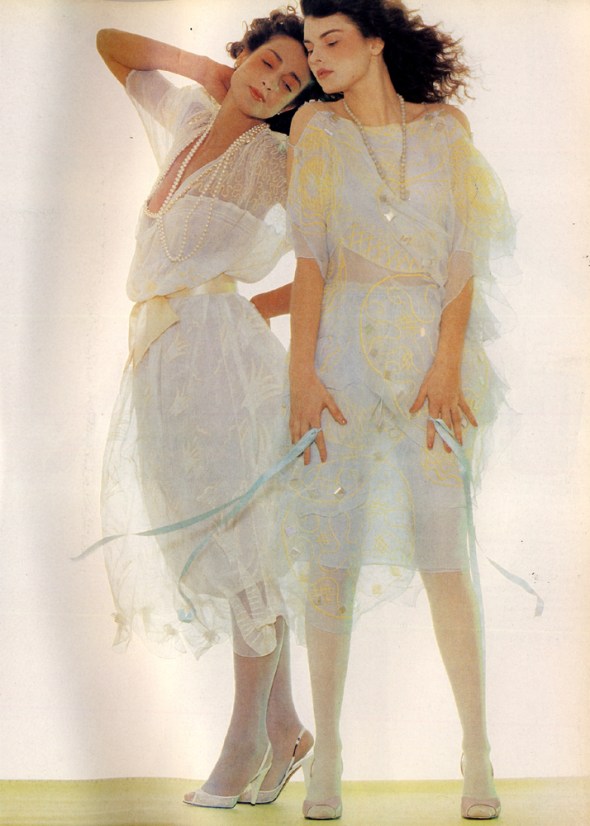 Hand-printed silk dresses by Zandra Rhodes. White net shoes from Midas. Lilac leather shoes by Karl Lagerfeld from Chloe.