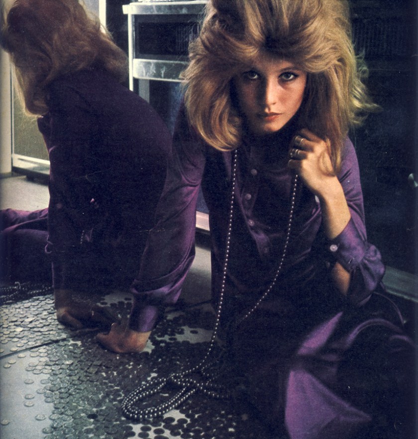 Purple tricel jersey shirtdress shimmying to ankle length by Clobber. Smoky grey pearl rope, 10 feet long, from Paris House.