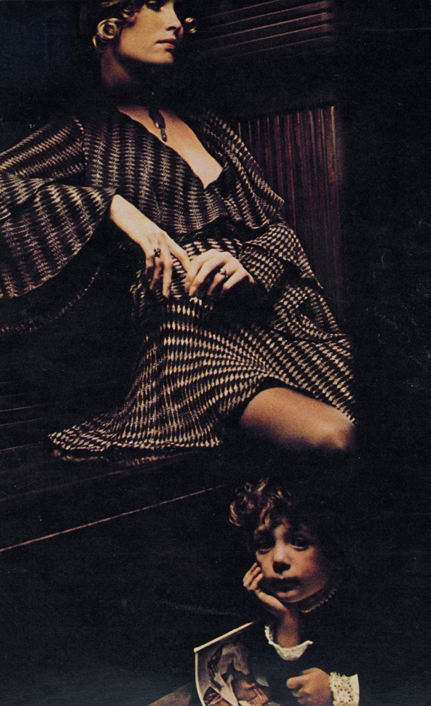 Knitted dress from The House of Worth. Hat at Brown's.