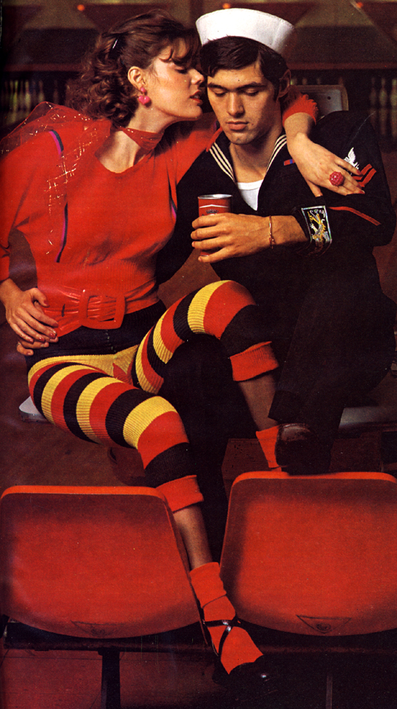 Red dolman sleeved sweater by Erica Budd. Pedal pushers made by rolling up footless tights by Mary Quant. Red leather belt from Bus Stop. Black snake platofmr shoes from the Chelsea Cobbler.